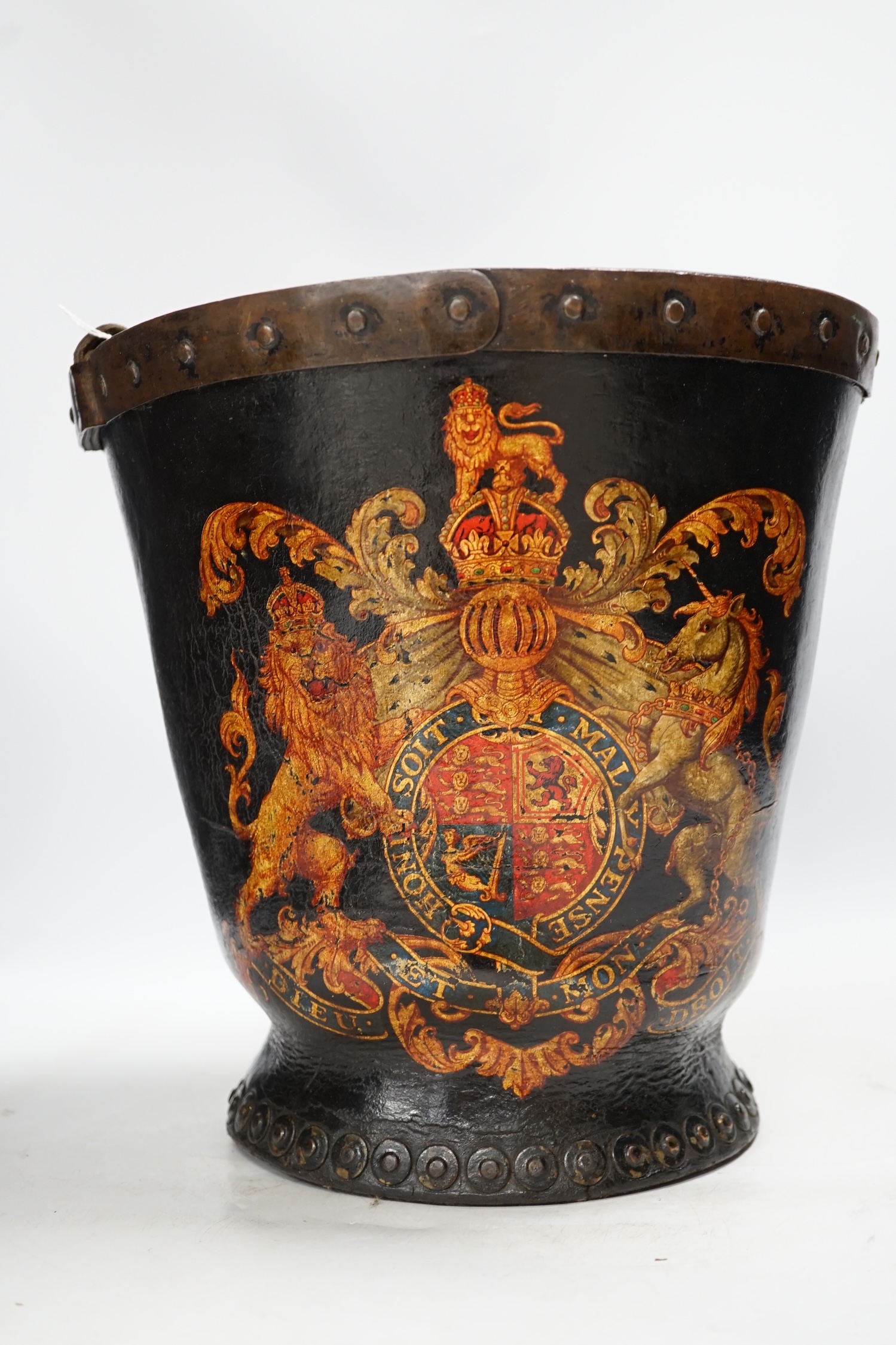 A 19th century painted fire bucket with swing handle, 29cm. Condition - fair